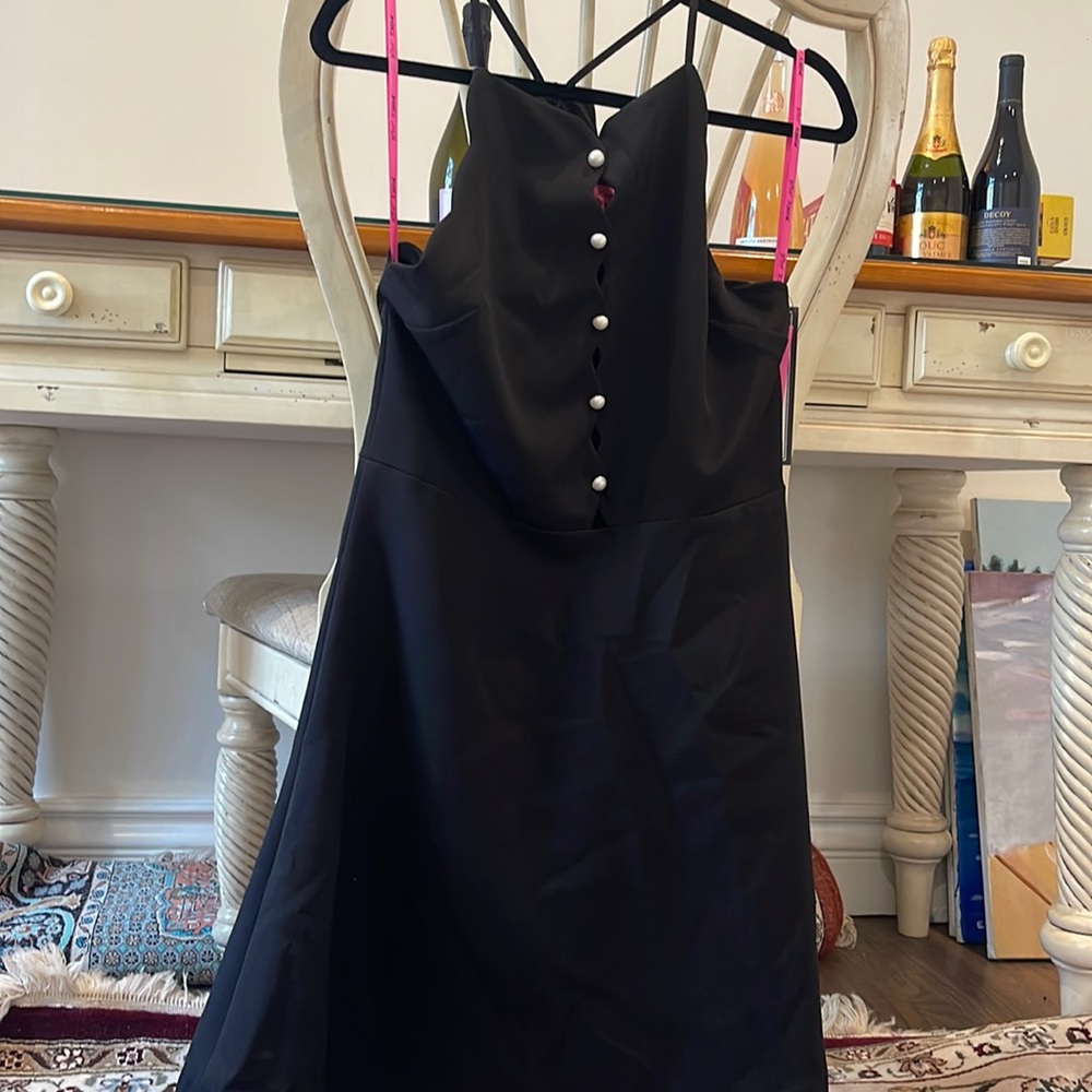 Betsy Johnson black dress with pearl buttons size 4. Brand new w tags
